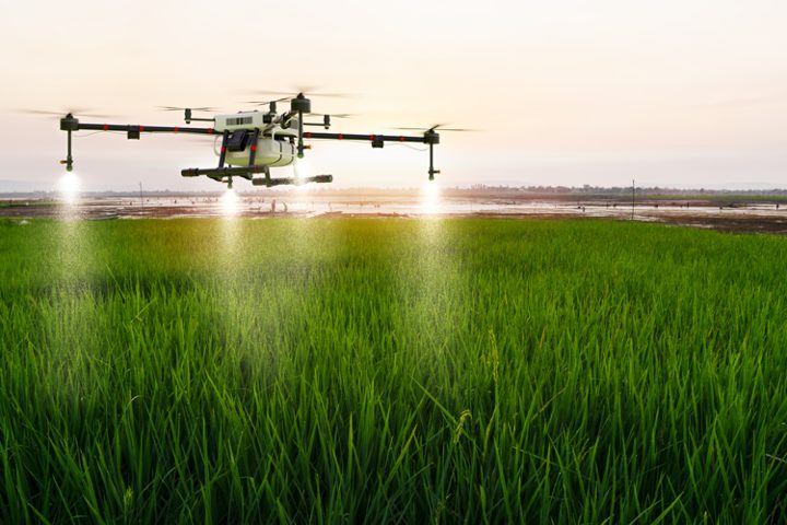 Drone deploying fertilizer in fields with the help of broadband services