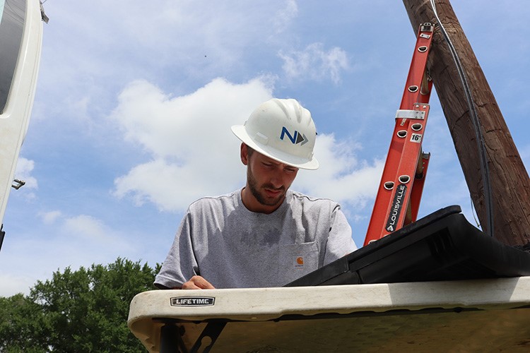 Wearing a hat will help keep the sun off your head when it is extremely warm on a job site. 