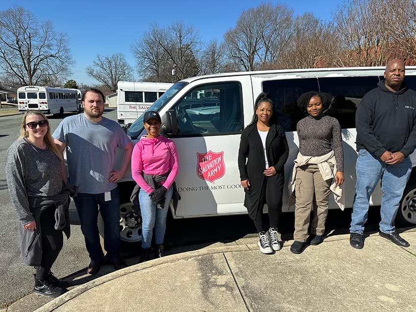 Team members from National volunteering were Corrine Dumas, Brian Goodlett, Sharon Fullerwinder, Shonda Seals, Audasia Newsome and Torey Searcy stand in front of Salvation Army Van.
