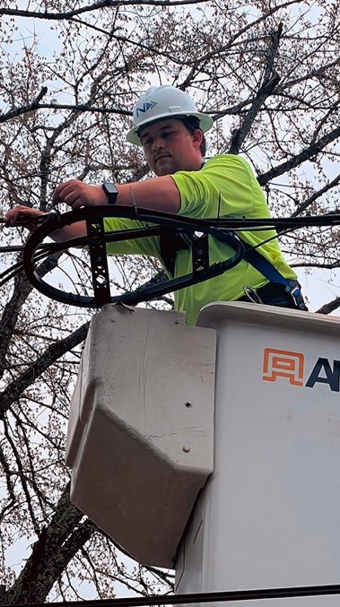 National OnDemand crewmen like Johnathan work in bucket trucks to help deliver fiber to people in rural parts of the U.S. 