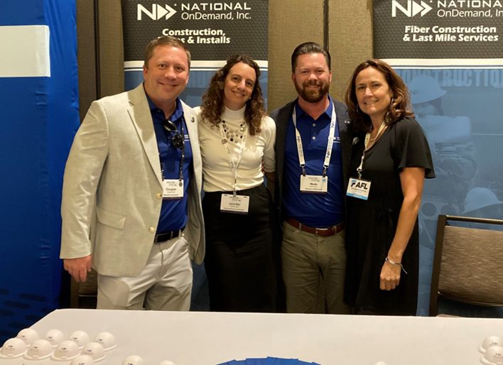 Douglas Boteler (CEO, National OnDemand), Jennifer Vassil (Director of Membership, Fiber Broadband Association), Wade Boteler (Director of Business Development, National OnDemand), and Kim Rickard (Manager, Membership Outreach & Engagement, Fiber Broadband Association) at the 2024 VMDABC Rural Fiber Expo on September 11, 2024. The VMDABC is dedicated to expanding high-quality broadband access to unserved communities in rural Virginia, Maryland, and Delaware.